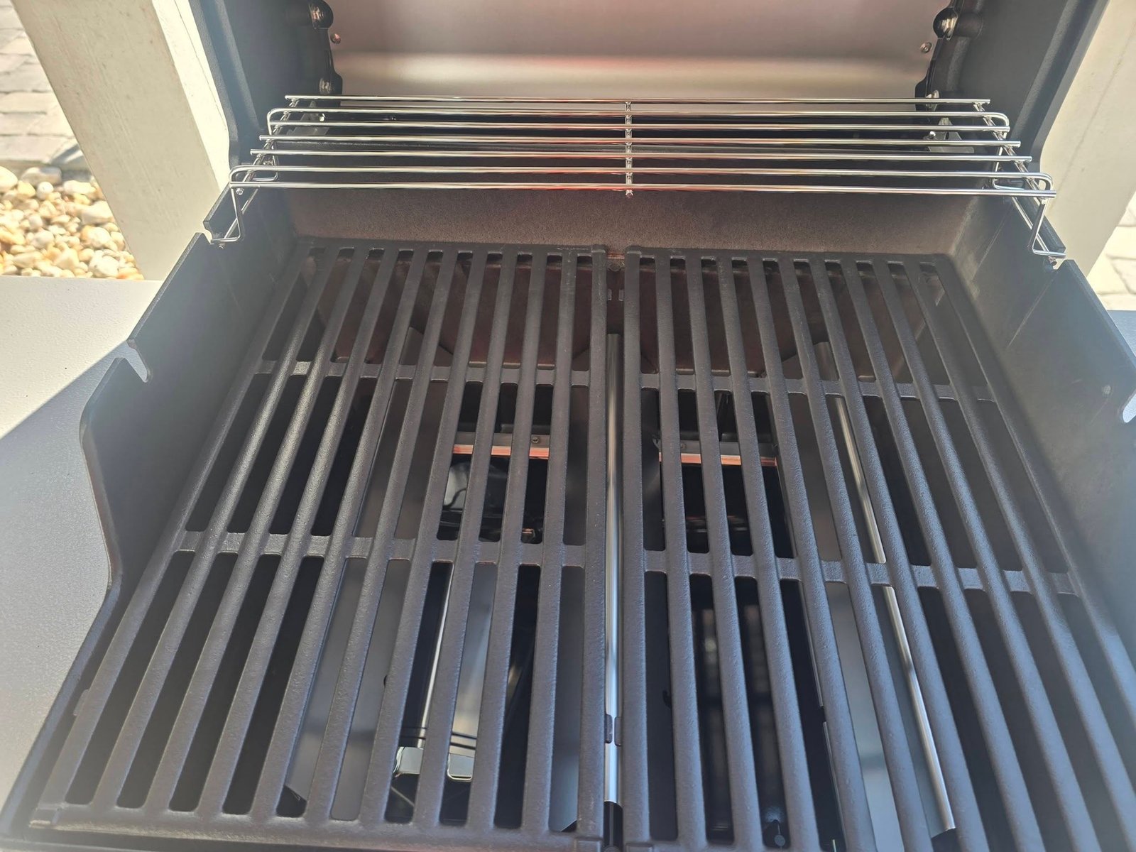 Spotless cast-iron grates inside a Weber Spirit grill